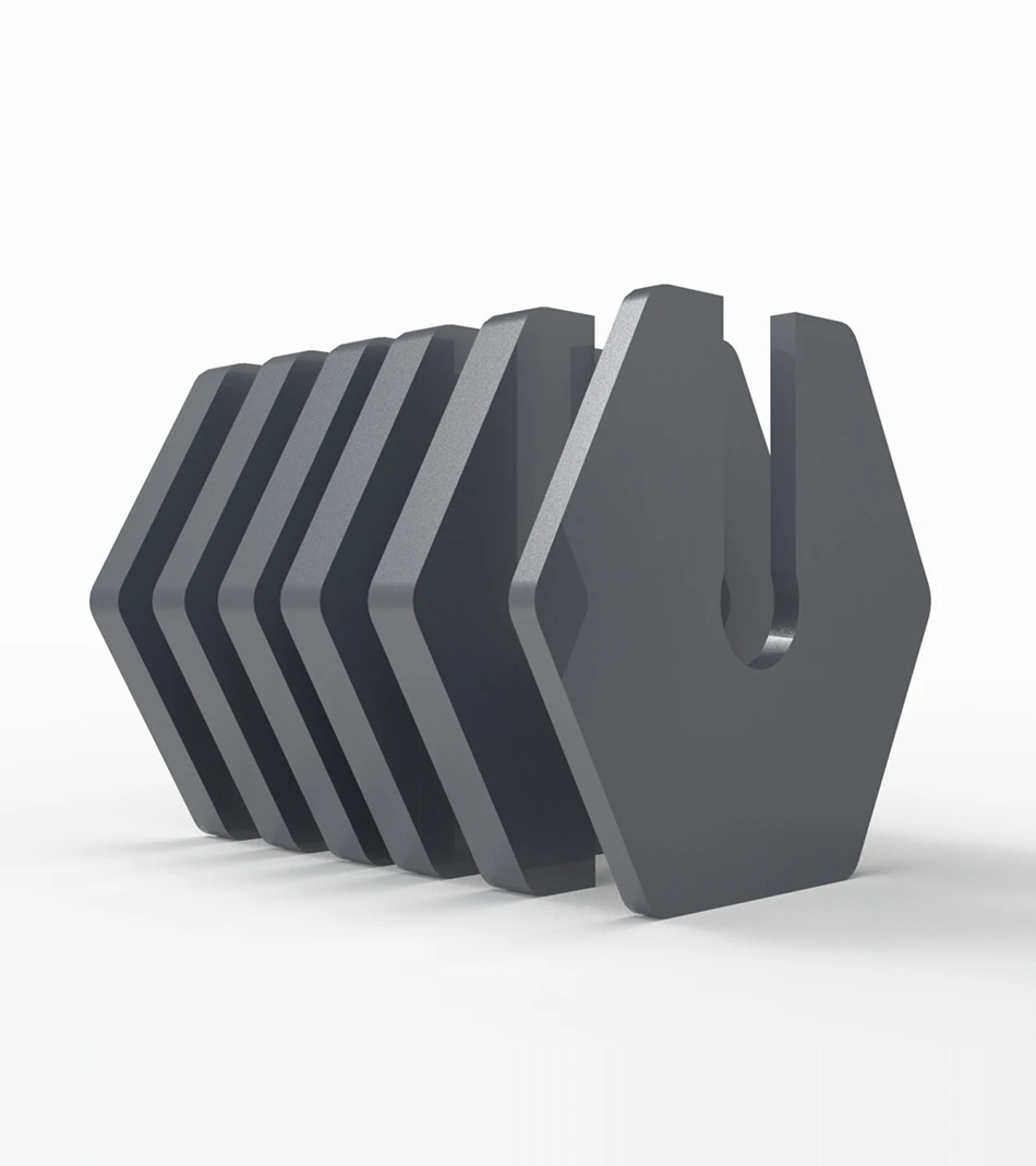A render of six Kabata weight plates nested in a row, the front one a hexagon cut with a U-shaped slot